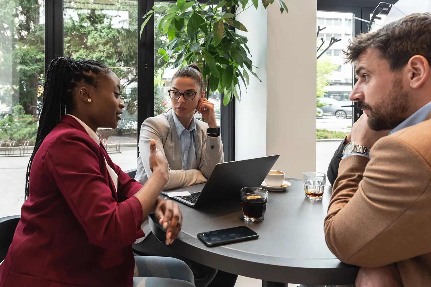 Black female real estate agent talking negotiating a contract